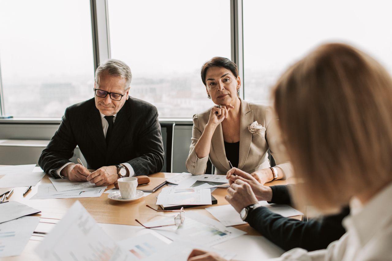 Executive demonstrating calm composure during a leadership conversation
