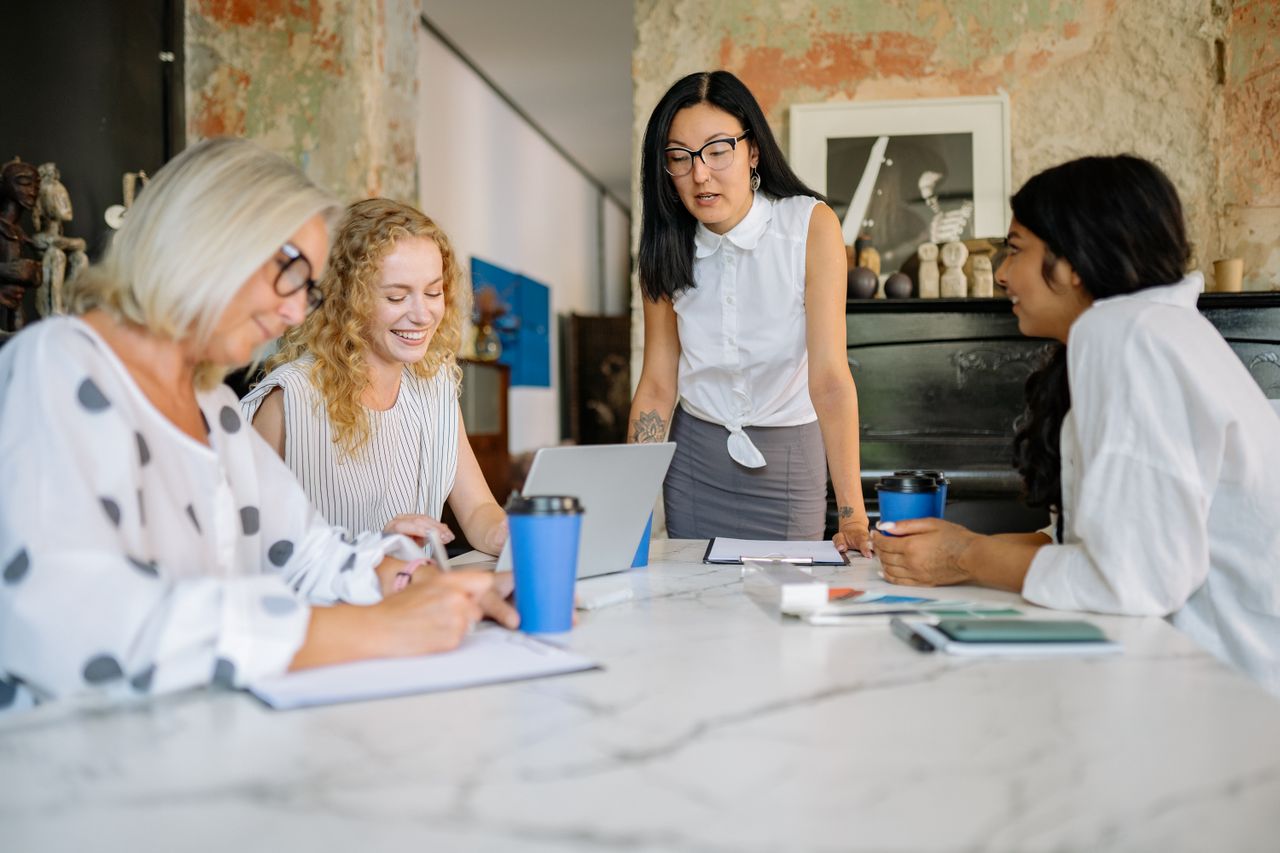 Leader demonstrating emotional intelligence and composure while listening to a team membe